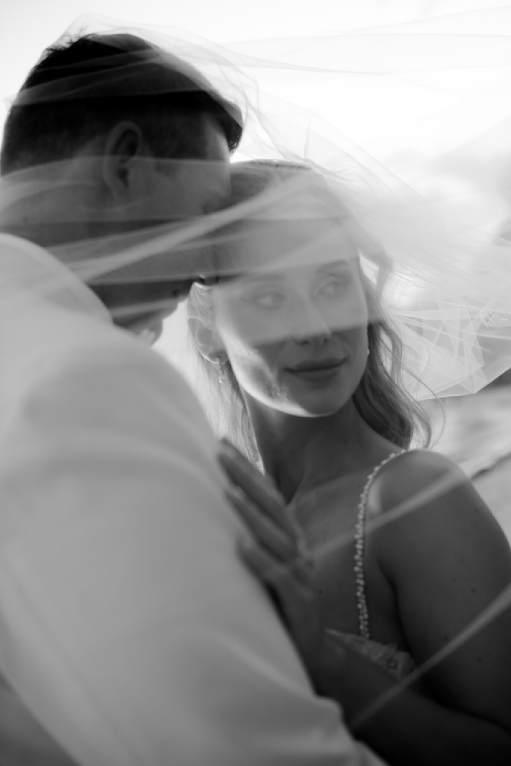 Bride portrait through veil during a destination wedding in Tulum Mexico