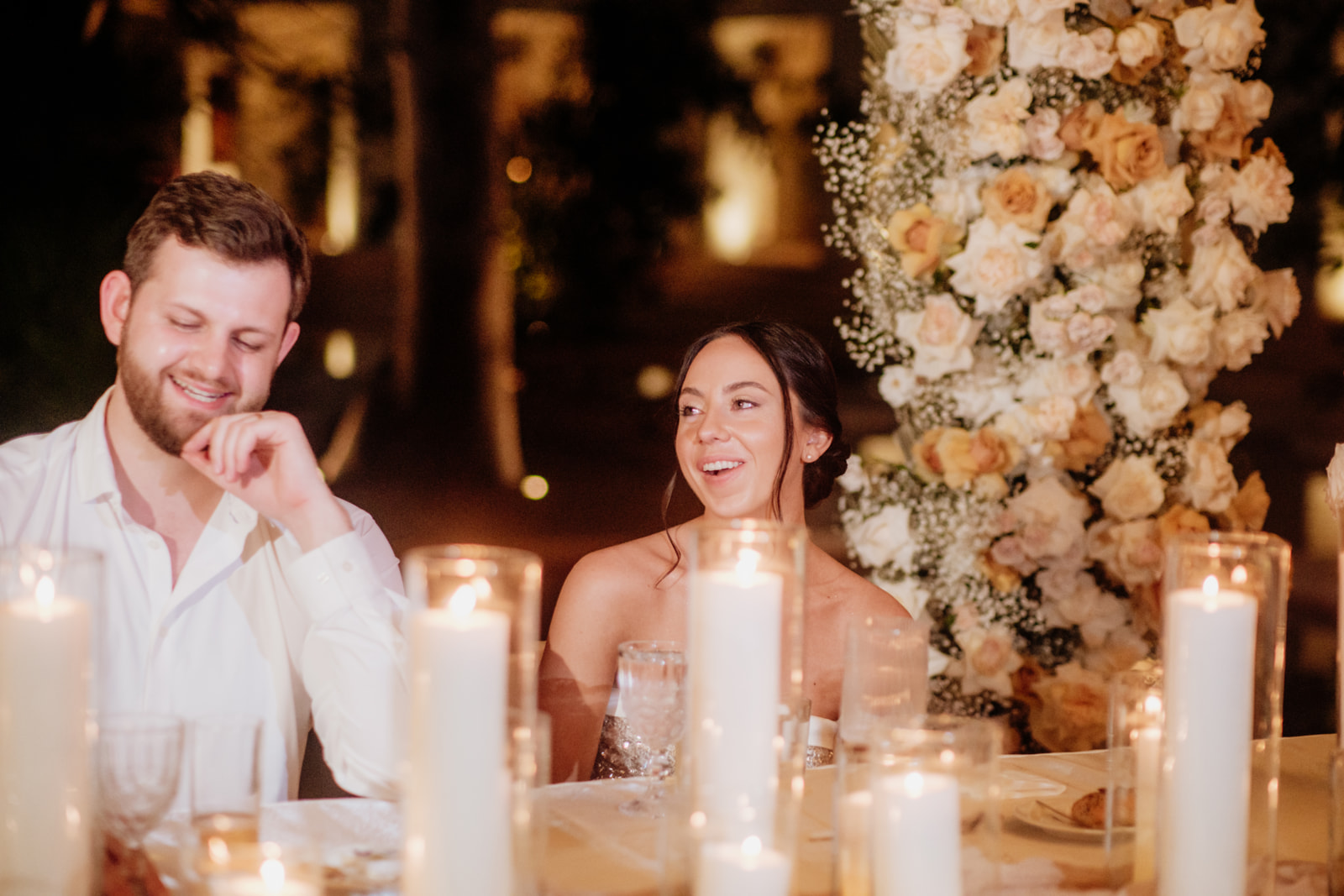Wedding guests celebrating together during a destination wedding reception in Tulum Mexico